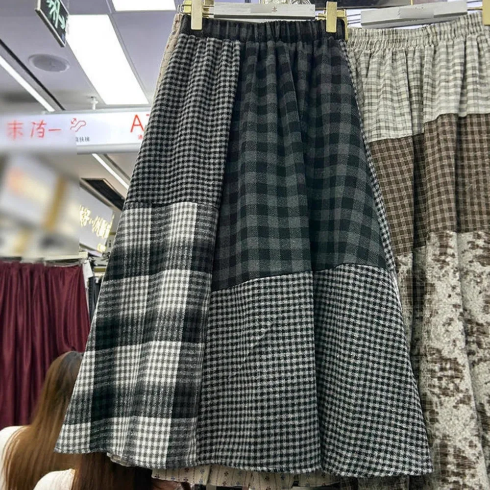 Nieuw in dames herfst winter onregelmatige geruite midi-rok 2025, vrouwelijke Koreaanse stijl, elegante hoge taille rokken