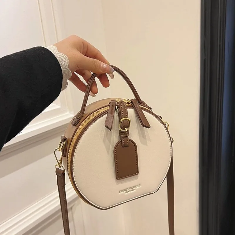 オリジナルレトロおむつバッグ女性用シンプルな無地トートバッグスタイリッシュでファッショナブルなレザー調スクエアサッチェル