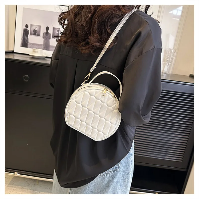 Bolso cruzado de diseño de nicho para mujer, bolso de hombro de marca de lujo Simple a la moda, bolso cruzado redondo pequeño informal para ir al trabajo