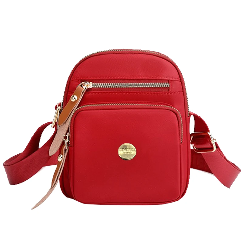 Neutrale, kompakte Mini-Taschen für Damen und Herren, ideal für Reisen und Ausflüge, mit einem schlichten Design für die Nutzung über eine Schulter. – Detail 7