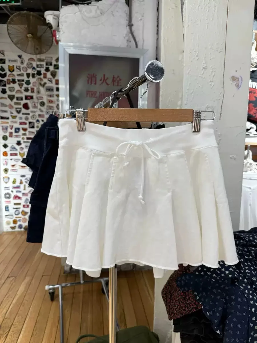 

Белая мини-плиссированная юбка на шнурке, женская летняя эластичная талия с необработанным подолом трапециевидной формы Faldas, милые спортивные короткие юбки в консервативном стиле Y2K