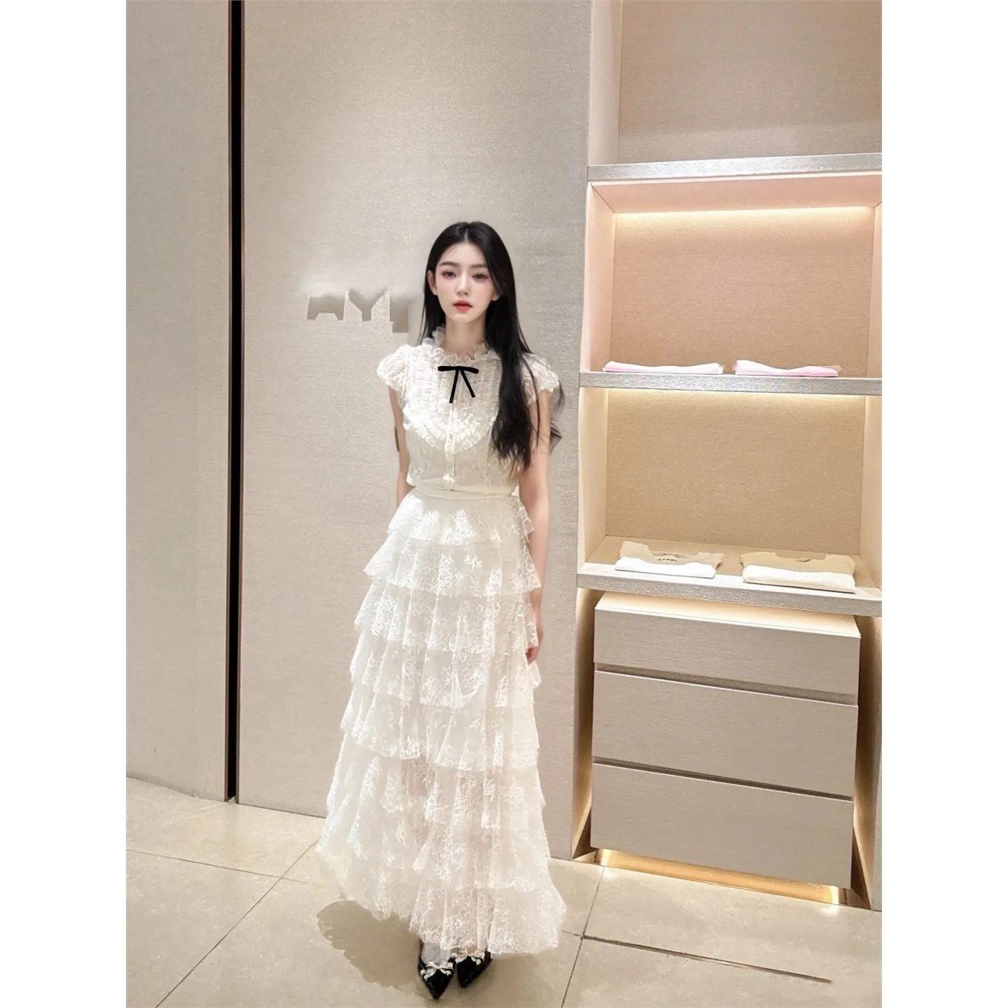 nuova-collezione-inverno-2025-gonna-lunga-a-strati-in-pizzo-bianco-design-a-vita-media-in-fibra-di-poliestere-per-donna