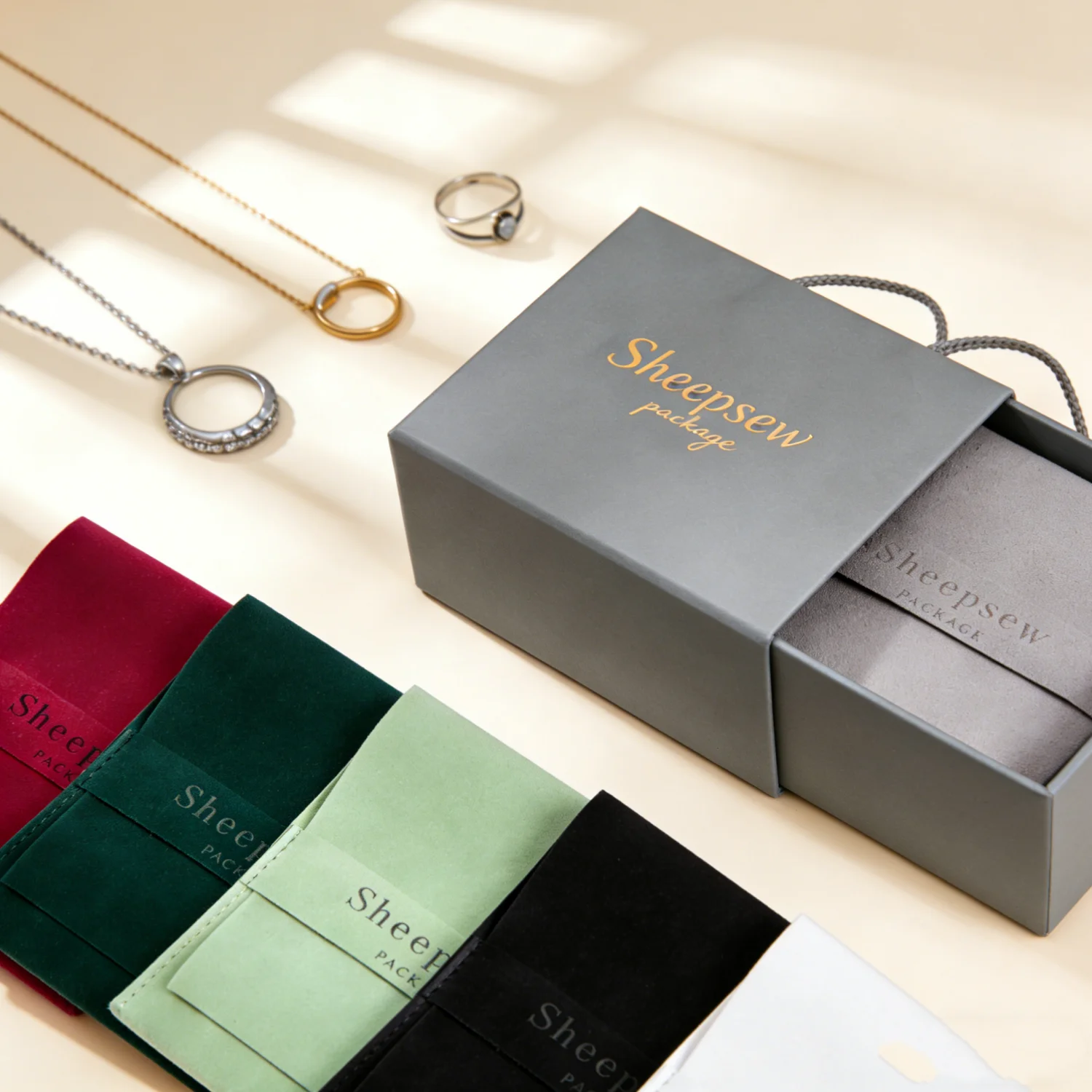 

SHEEPSEW Personalized Logo Jewelry Drawer Box Snap Button Suede Pouch Set For Earring Bracelet Gift Wrapping