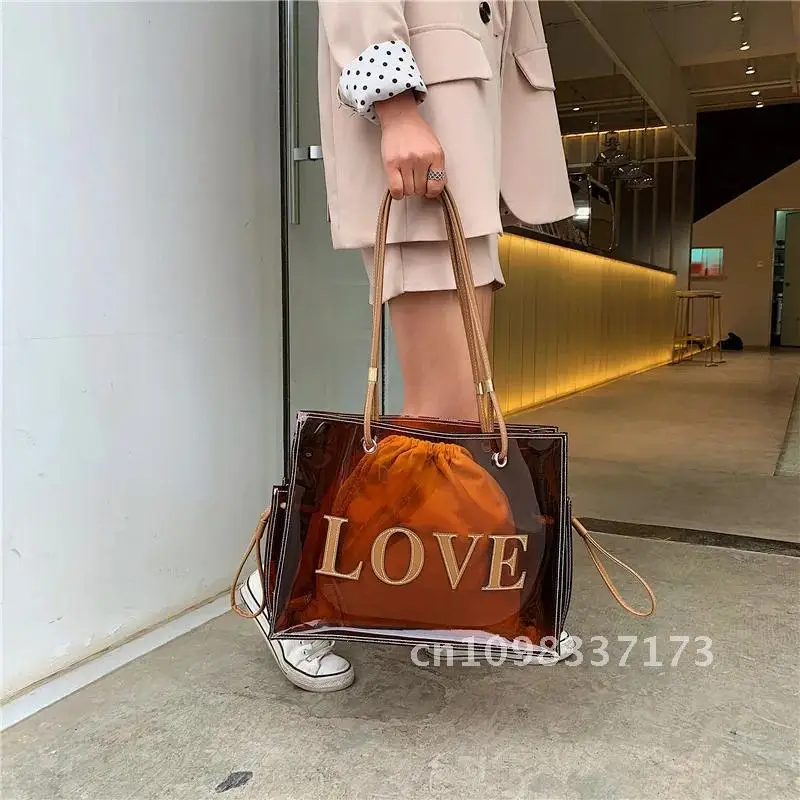 新しい女性の夏の透明ゼリーバッグ女性の大容量シングルショルダー通勤トートバッグ
