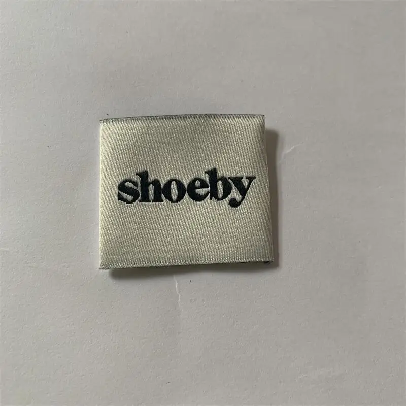 Factory Price Customized 3.5*3cm Creamy White Background Clothing Woven Labels