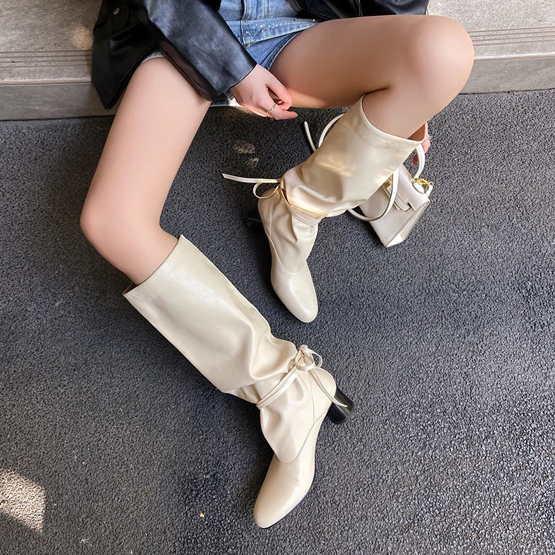 

Arden Furtado 2025 Autumn sheepskin Ankle strap Modern boot Round toe Pull-on Chunky heels Pleated Knee high boots