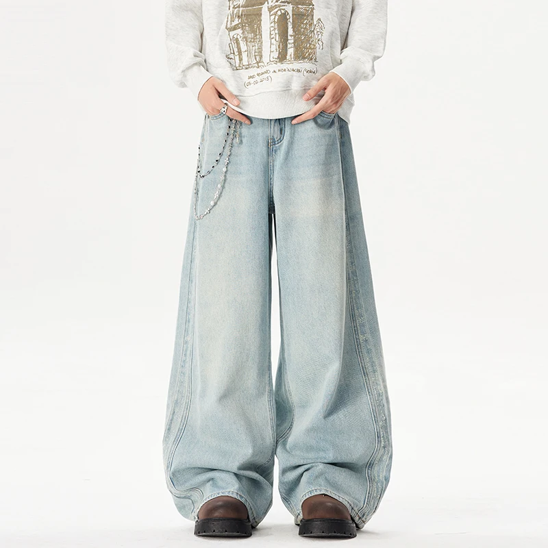 

Мужские светло-голубые джинсы с эффектом потертости и рваными элементами, свободного кроя, широкие прямые штанины в американском стиле, джинсы в пол в стиле хип-хоп
