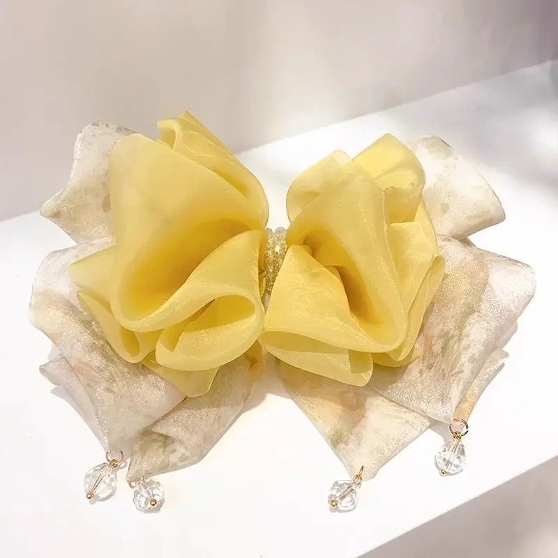 

New Chinese style mesh bow spring clip for women's high-end new lightweight handmade crystal tassel hair accessory