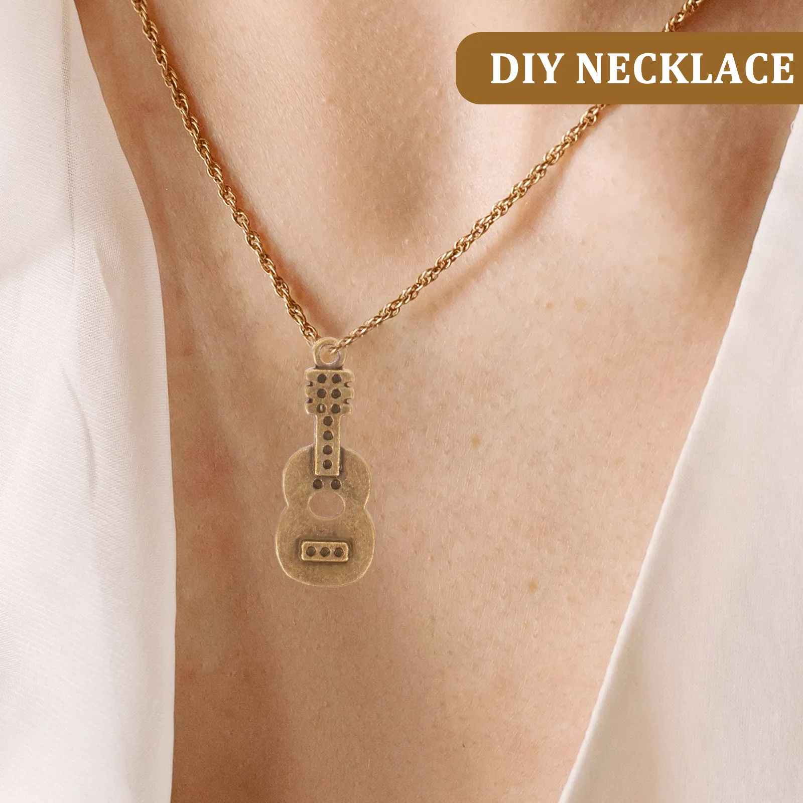 

50Pcs Retro Alloy Guitar Pendants Unique Instrument Charms for Handmade Jewelry Crafting Pendant Supplies Guitar Pendants