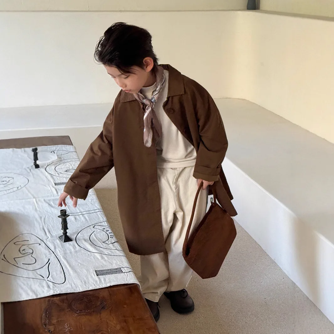 

Детская одежда: Новое демисезонное пальто для мальчиков и девочек 2026 года в корейском стиле, повседневное, стильное, средней длины, универсальное, трендовое.