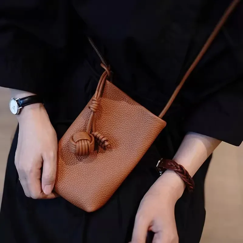 Versatile artistic small fresh small round ball pendant crossbody phone bag, soft leather cute mini bag for women view 6
