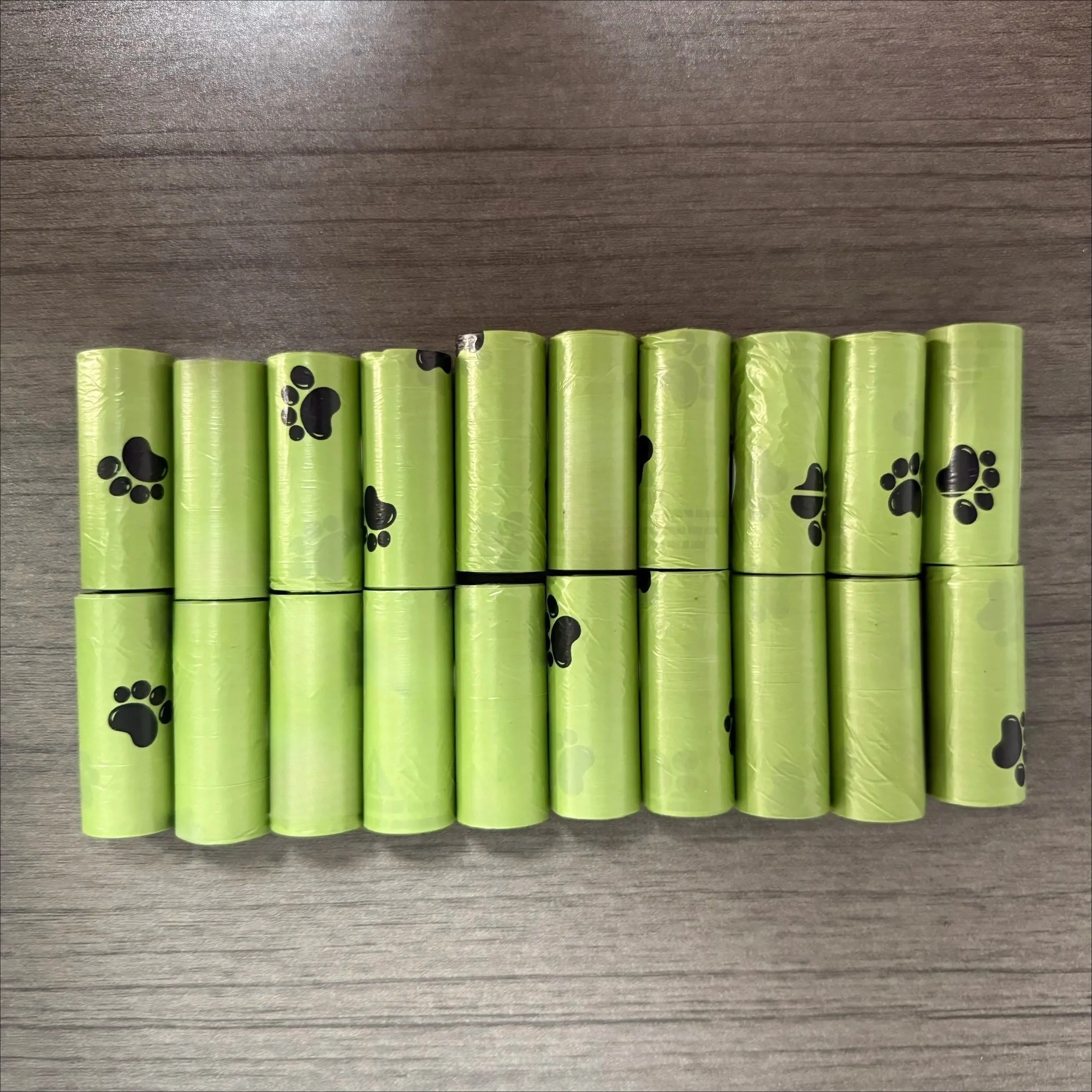 Hochwertige Hundekotbeutel - 20 Rollen, dick, auslaufsicher, langlebige Haustier-Müllbeutel mit niedlichem Pfotenabdruck-Design.