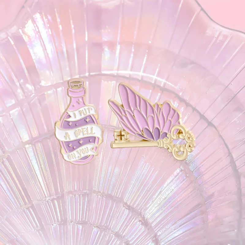 Romantic Magic Enamel Pin Magic book potion butterfly wings key beautiful brooch Bag Accessories Metal Badge Jewelry Wholesale