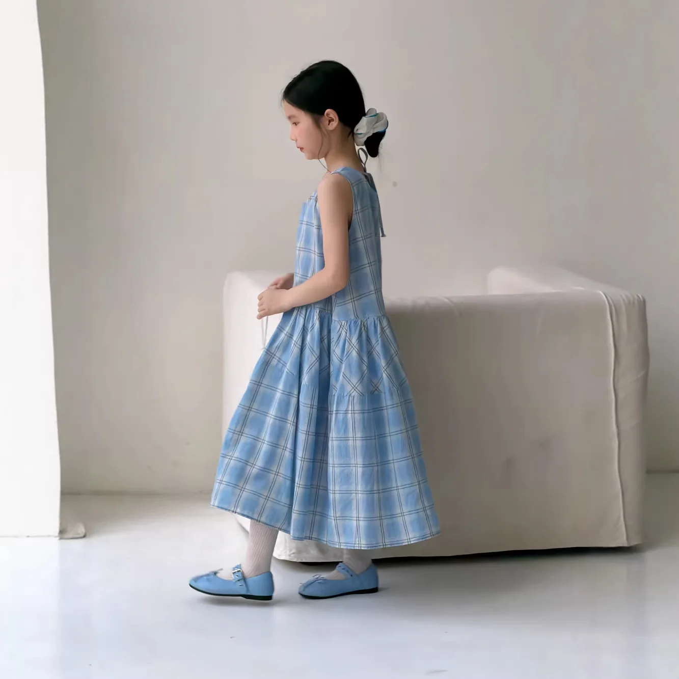 

Children's Dress 2026 Summer Girls' Korean Checkered Casual Strap Skirt Children's Versatile Loose Sleeveless Dress