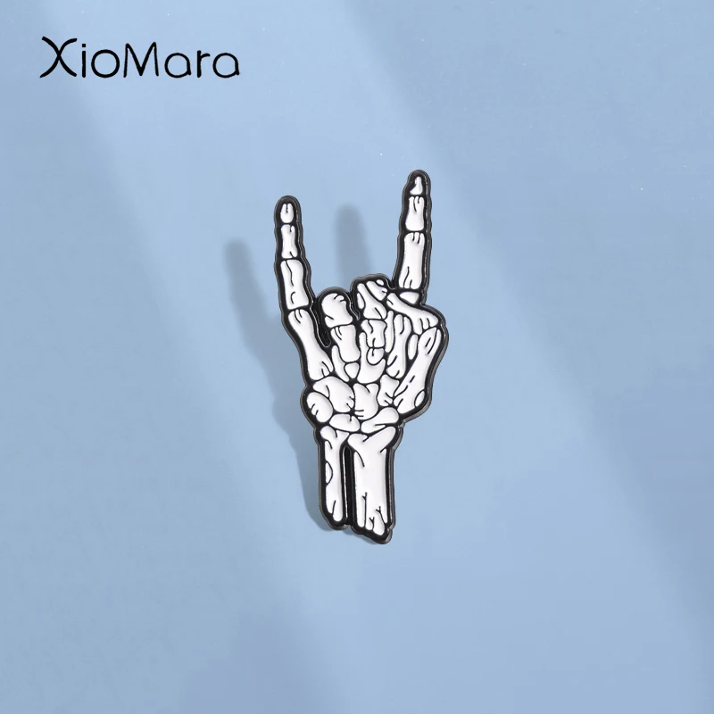 

Halloween Skeletal Hand Enamel Pins Custom Rock and Roll Gesture Brooches Lapel Badges Punk Gothic Jewelry Gift for Kids Friends