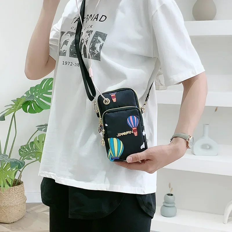 New Mobile Phone Bag Female Crossbody Mini Bag Three-layer Zipper Nylon Vertical Model Change Bag