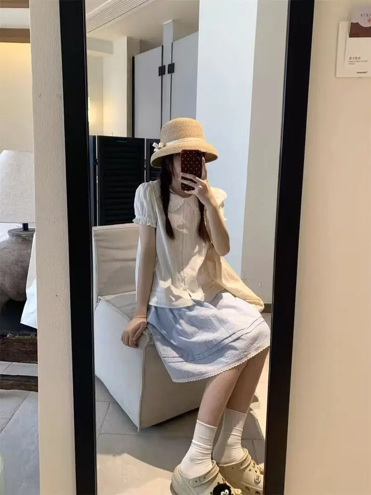

Summer 2025 New White Hollow out Design Doll Collar Bubble Sve irt Women's Loose Fit Korean Sle Commute Pure Color