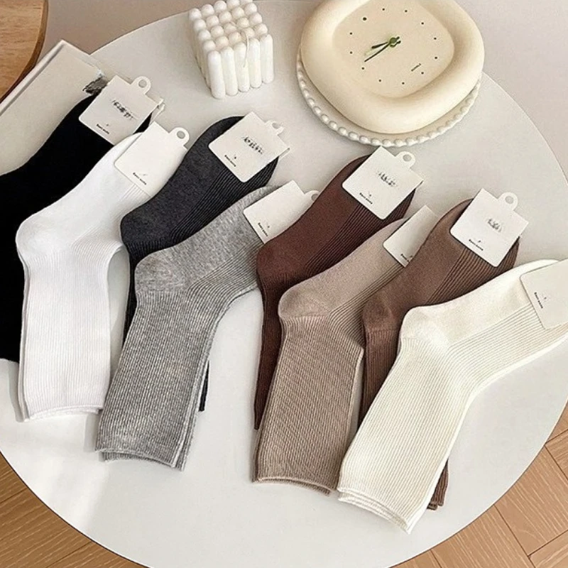 

8 pairs of solid color comfortable cotton socks for women in autumn winter mid tube sweat absorbing casual women's socks