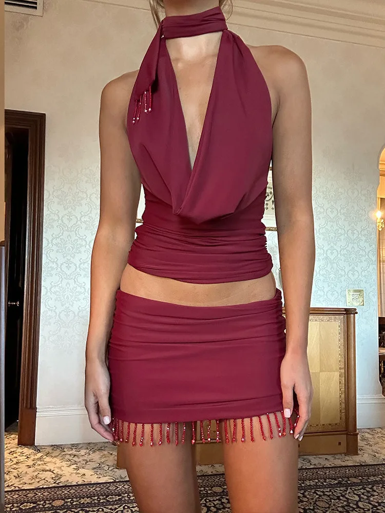 

Сексуальная мини-юбка с кисточками, комплект из 2 предметов, женская укороченная юбка с воротником-хомутом и завязкой на шее, укороченная майка с открытой спиной, облегающая юбка с низкой посадкой, наряд Y2K