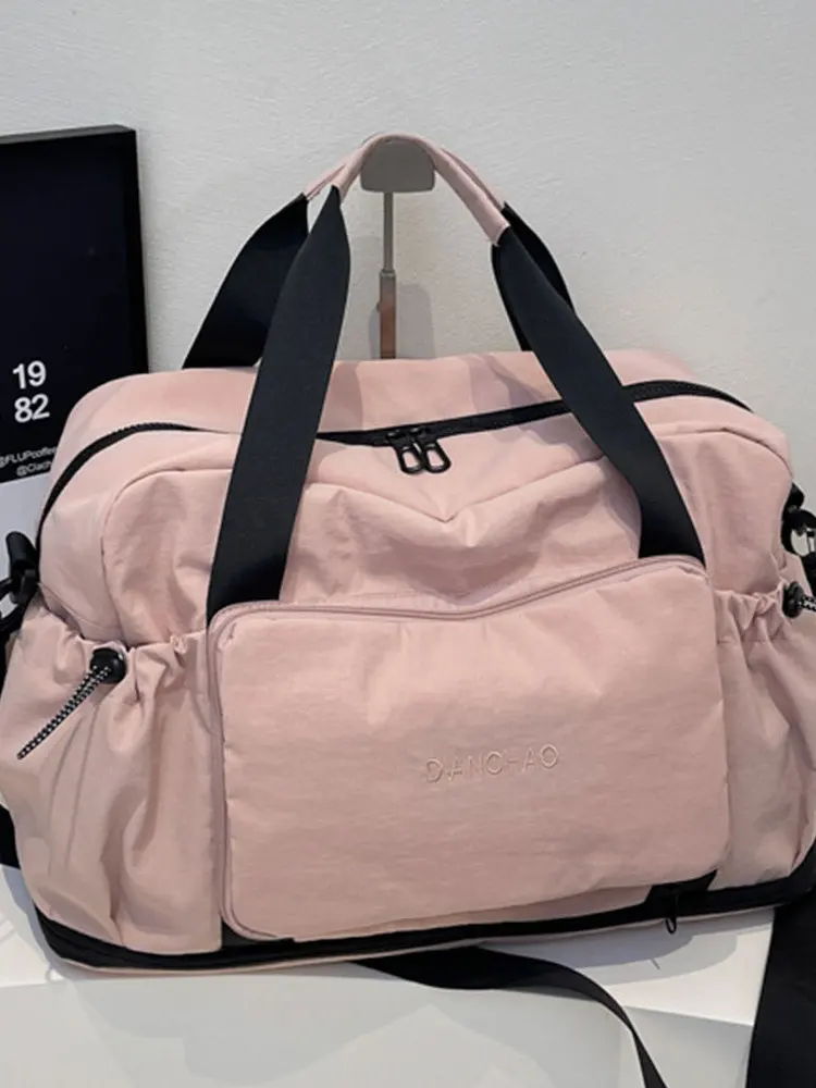 拡張可能なトラベルバッグ女性用ハンドヘルド折りたたみ式大容量荷物収納バッグ搭乗バッグポータブルスーツケース耐久性