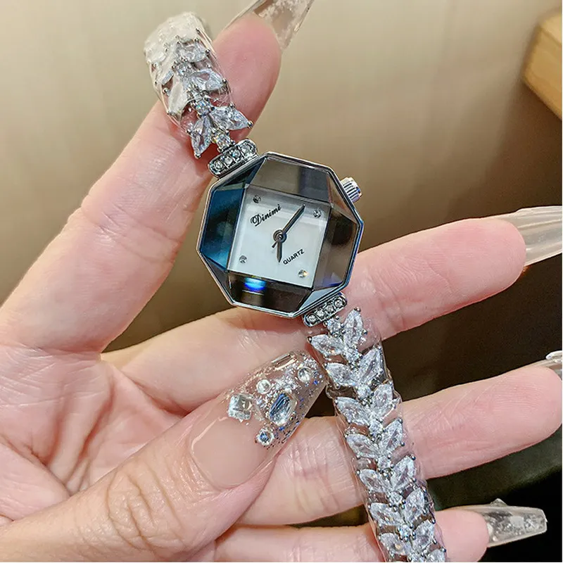 Dimini fashion quartz watch with diamond design sense bracelet  diamond temperament beauty fishtail women watch