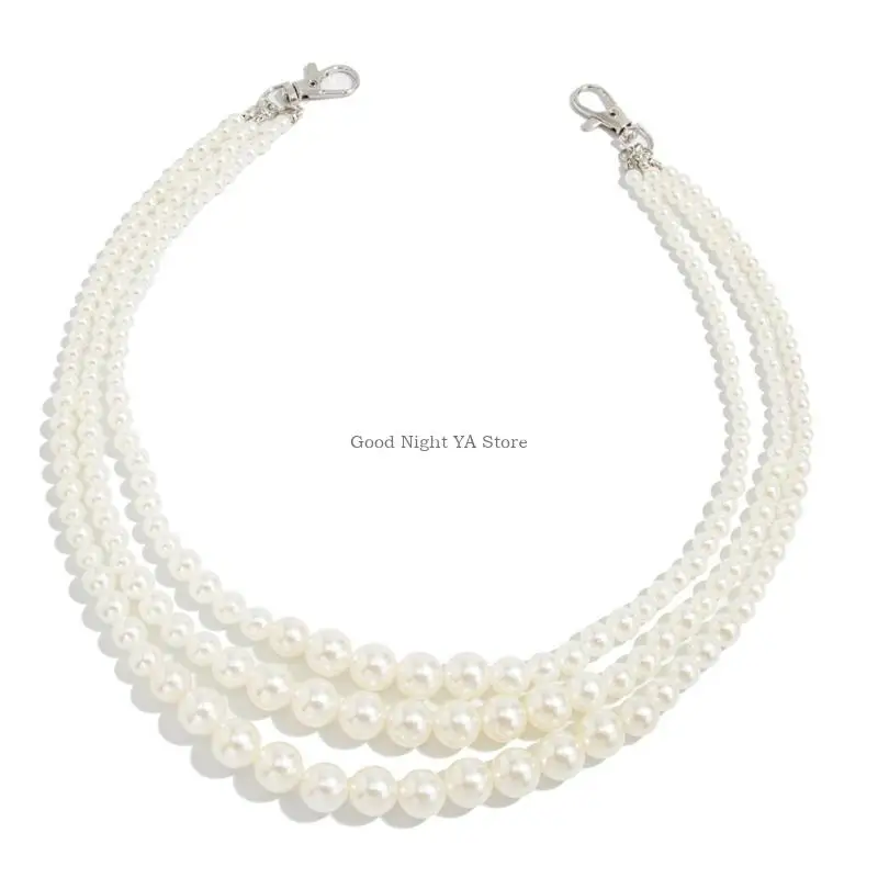 حقيبة يد بسلسلة جانبية من اللؤلؤ على سروال الجينز لراقصات الفتيات في العقد الأول من القرن الحادي والعشرين #1