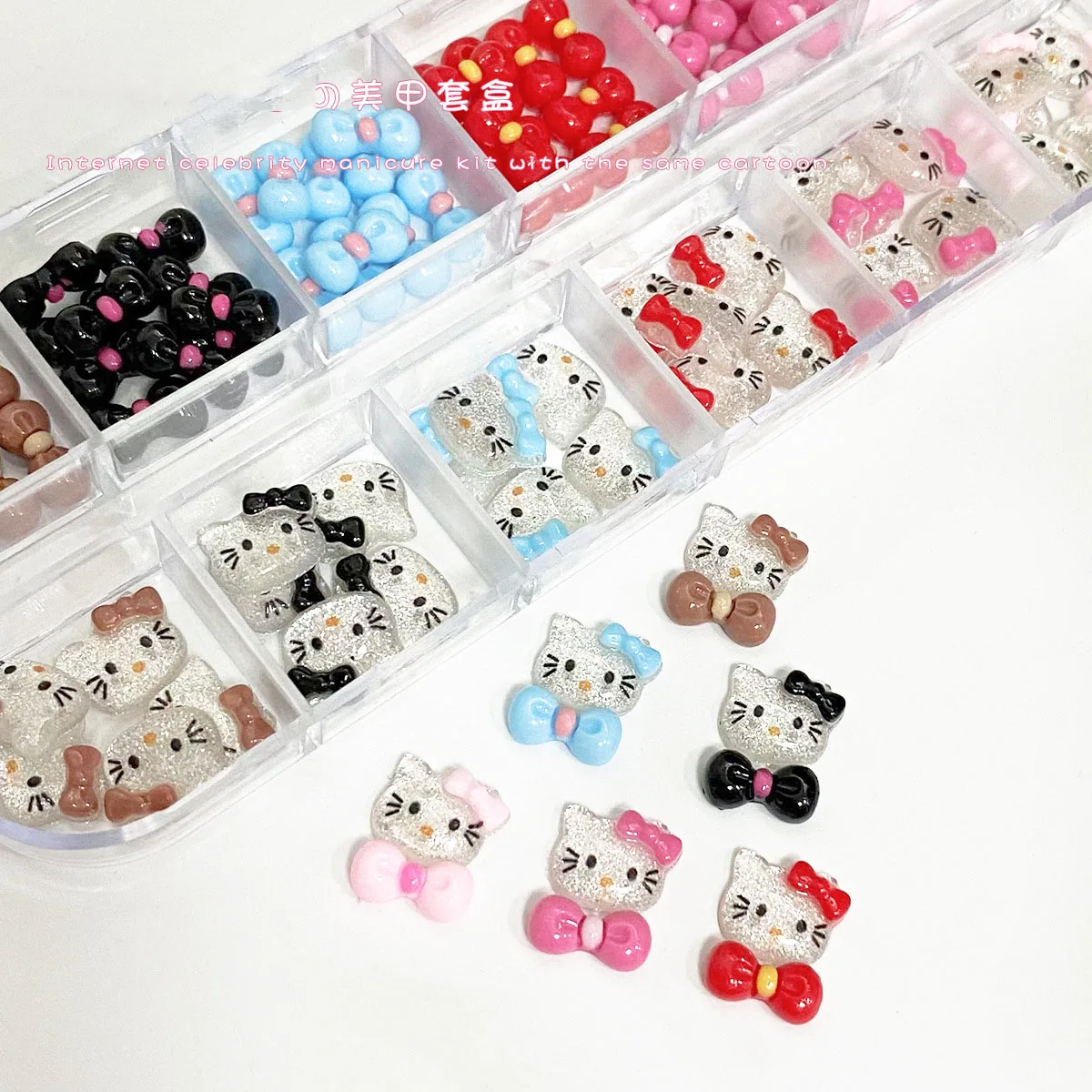 

12Grids 3D Summer Bows Hello Kitty Nail Charms Pink/Red/Blue/Black/Brown Icy Translucent Cat Head Nail Accessories Nail Supplies