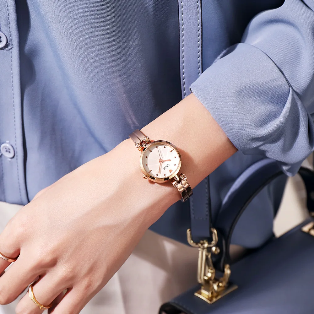 Small round women's watch with steel strapsimple and casual, petite student wristwatch, women's quartz watch, women's accessory.