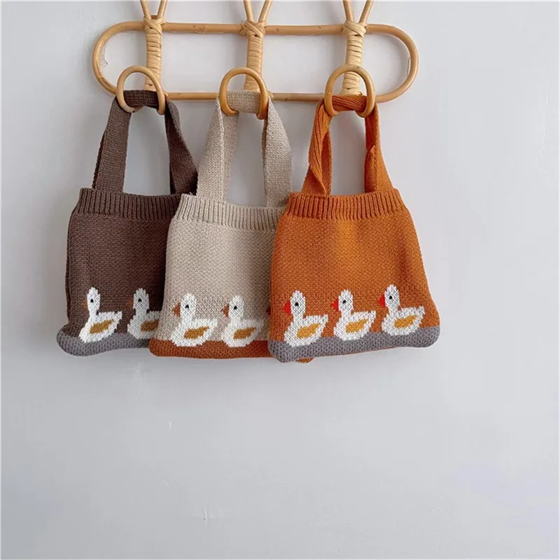 Bolso pequeño de punto con dibujos de pato para niños y niñas, bolsa de almacenamiento portátil para aperitivos y monedas, estuche para Otoño e