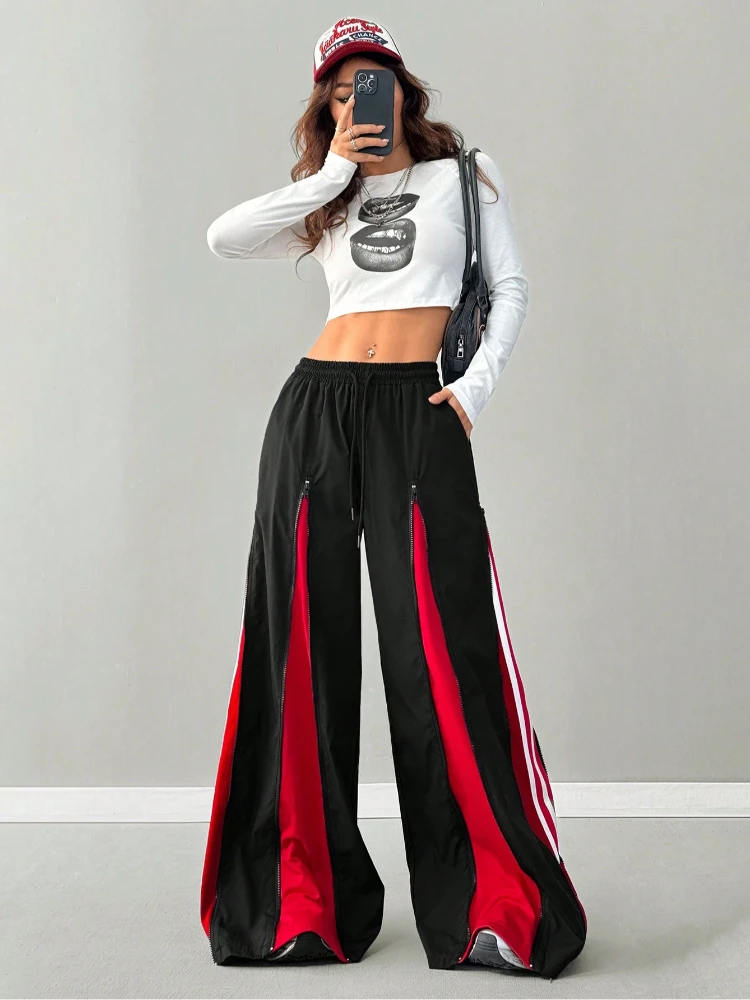 アメリカのストリート系ホットガール、カラーブロッキングトレンドファッション、原宿ヒップホップスタイル、ジッパー付きスプライシング、レトロな個性、ゆったりとしたフロアパンツ