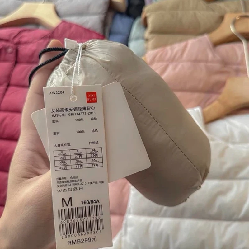 50% + سترة بيضاء خفيفة الوزن للغاية قابلة للتعبئة ببطانة دافئة 2025 سترة نسائية خفيفة الوزن بدون أكمام منتفخة #6