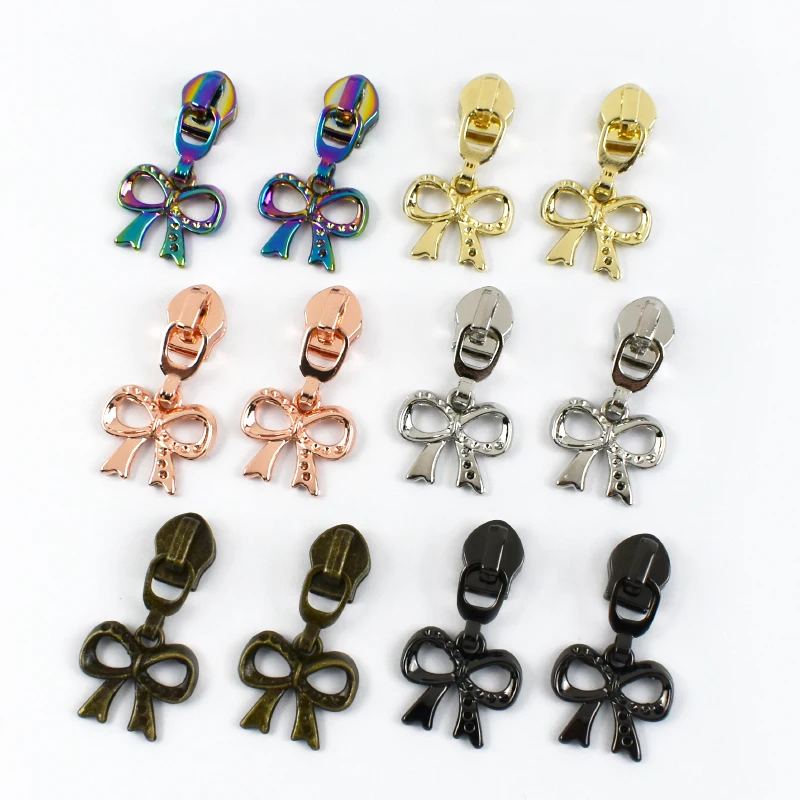 

10-50Pcs 5# Bow Nylon Zippers Slider Bag Ziper Puller Head Clothes Closures Zipper Cursor Sewing Zip Tongue Fidget Sliders