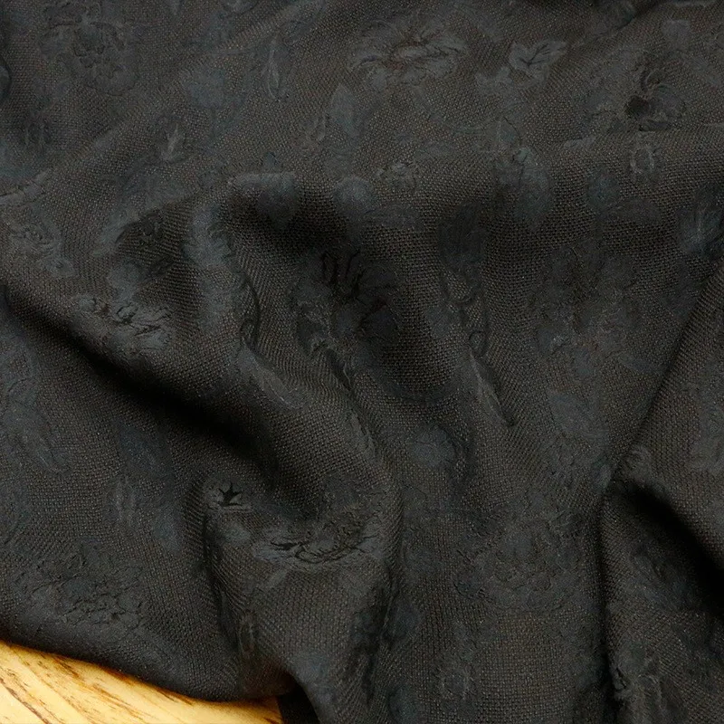 The fabric of new Chinese-style cheongsam is made silk with entwined  perforated and fragrant gauze It yellow brown