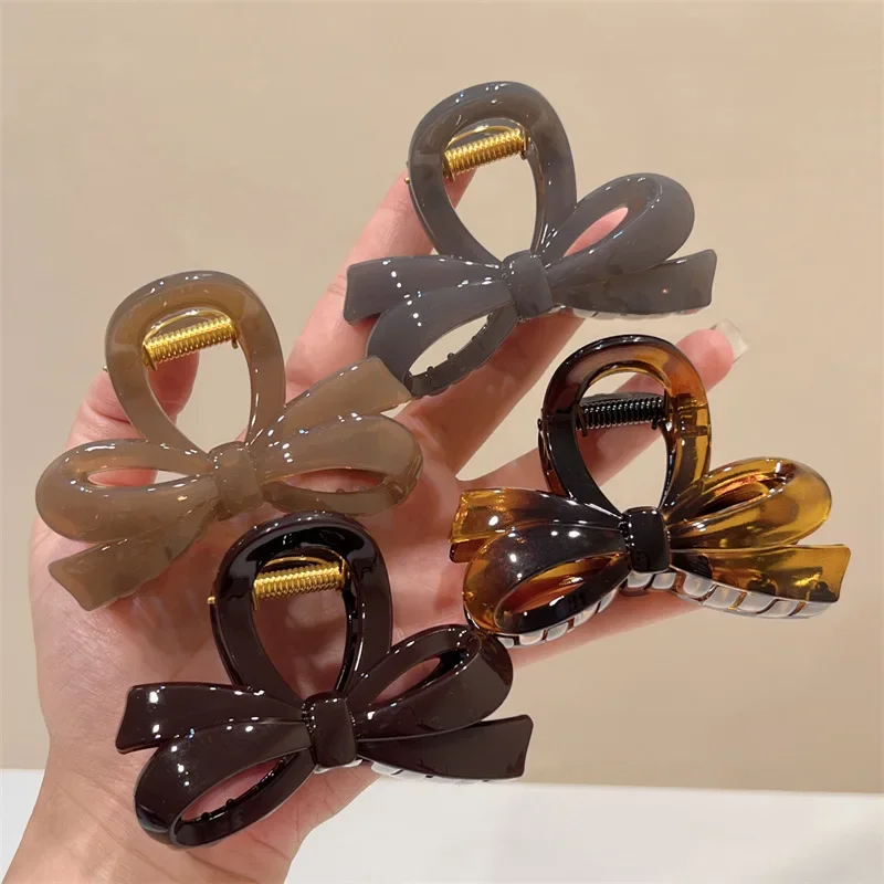 ربيع 2025 - يجب أن يكون الصيف! مشبك على شكل فيونكة متوسطة الحجم للسيدات على الطراز الكوري، رمادي قهوة، مشبك سمك القرش بسيط ومتعدد الاستخدامات