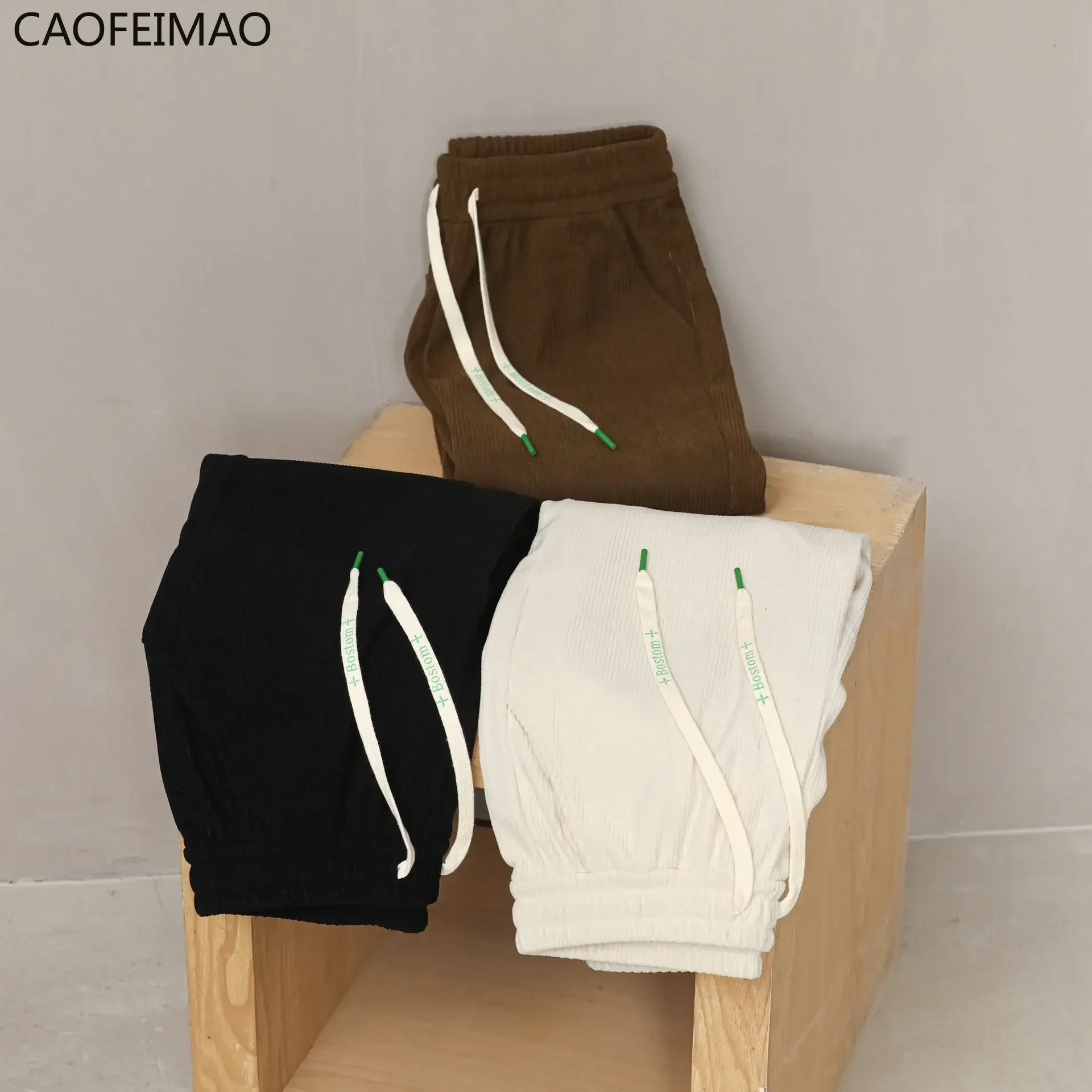 Primavera y otoño de las mujeres nueva cintura alta suelta de gran tamaño mostrar pantalones sanitarios finos paquete de pana pie pantalones casuales marea