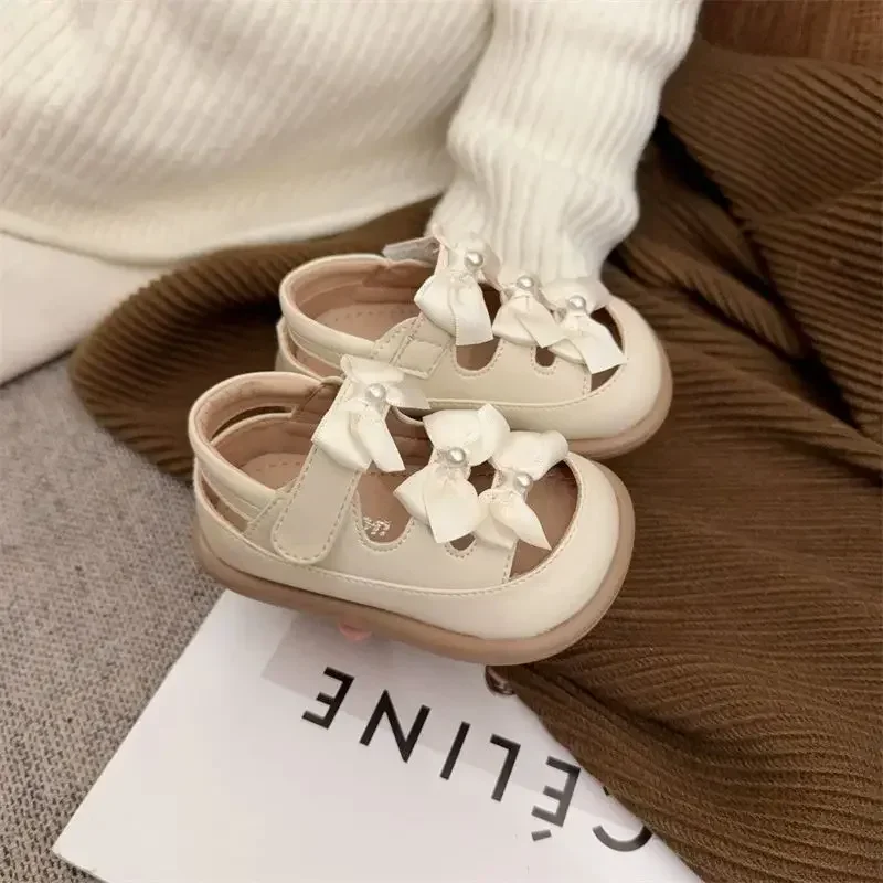 

Girls Princess Shoes Toes Capped Anti-kicked Baby Walking Shoes Breathable 2025 Summer New Girls Sandals Sweet Bows Ins Trendy