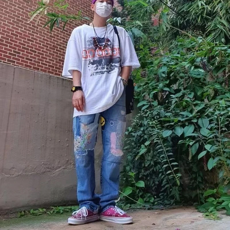 كابيتال خمر الدينيم السراويل المرقعة وجه مبتسم التصحيح ممزق هول التطريز شارع العليا أزياء العلامة التجارية جينز طويل