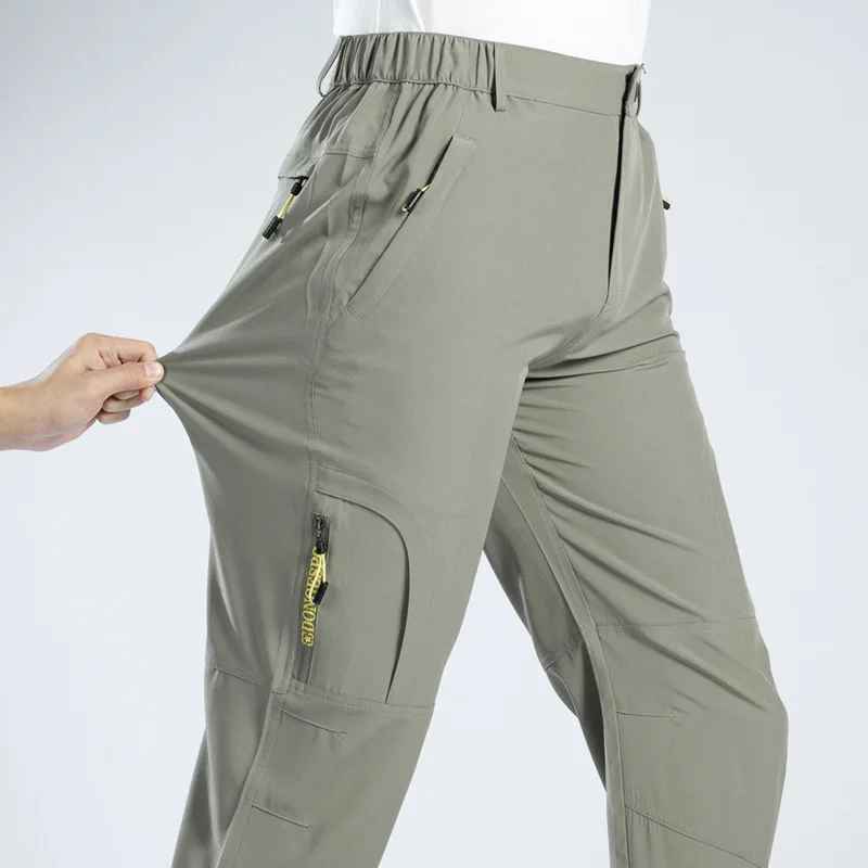 

2026 Summer Thin Loose Sports Quick-drying Trousers Outdoor Storm Pants Hiking Trousers Baggy Pants
