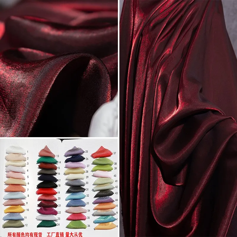 

The wine red glass silk satin gradient fabric for Hanfu trousers skirts and wedding dresses is skin-friendly breathable lustrous