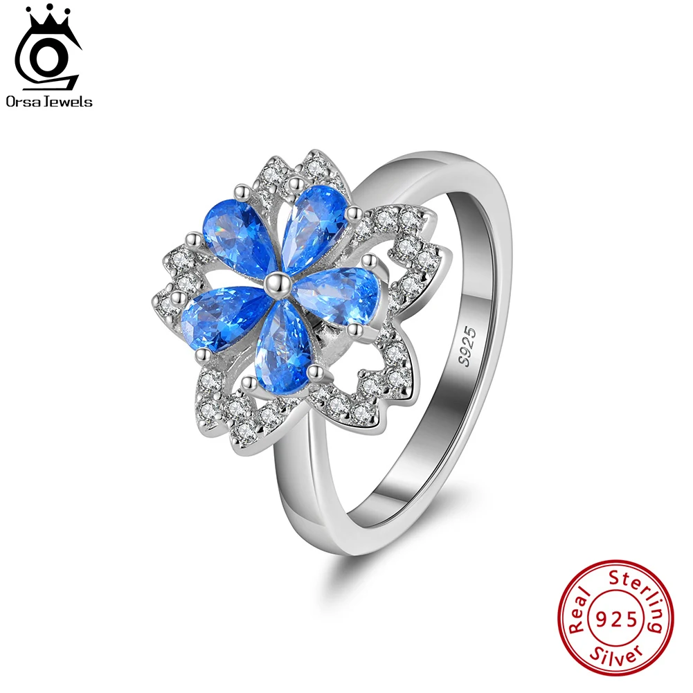 

ORSA JEWELS Exquisite 925 Sterling Silver Rotatable Flower Shape Blue 5A Cubic Zircon Rings for Women Anniversary Gifts LMR05