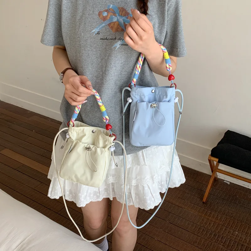 Nylon lightweight women's mobile phone bag go out simple restraint mouth pull rope loose change earphone shoulder bag