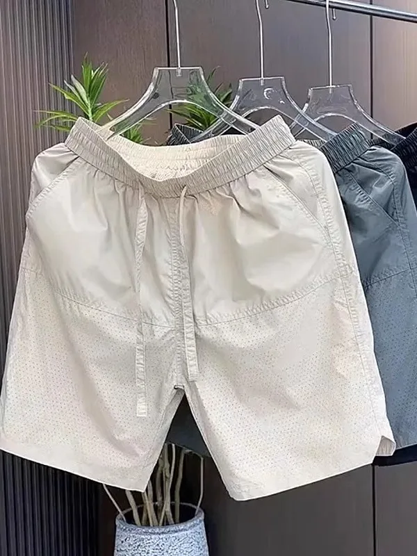 

Летние новые дышащие повседневные брюки-шорты с лазерной перфорацией для мужчин, простые спортивные универсальные свободные быстросохнущие брюки-шорты до колена