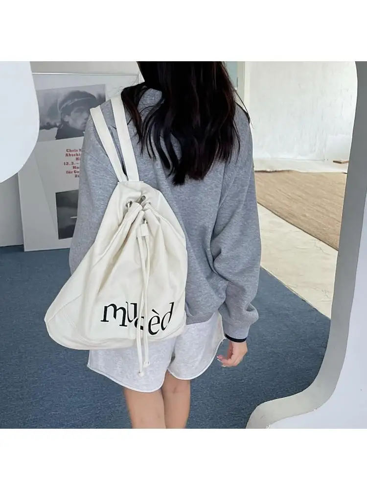 Korean version new double shoulder drawstring backpack minimalist letter printed canvas bag portable large capacity shopping bag