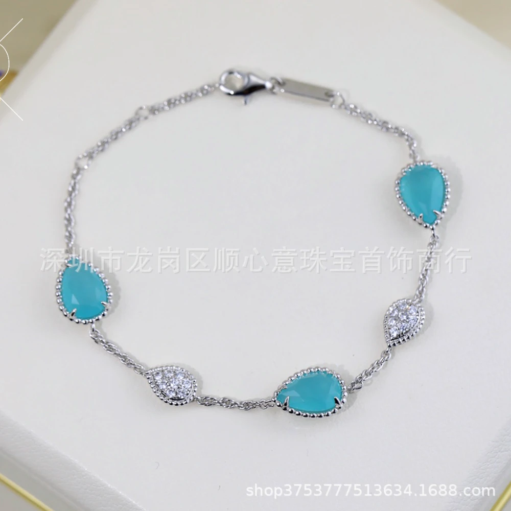

925 sterling silver plated with 18K gold, carnelian and mother-of-pearl embellished diamond teardrop shape bracelet