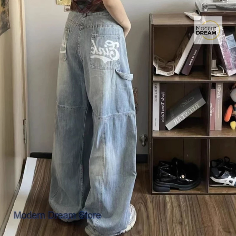 

American style retro design light machete jeans female summer fashion temperament letter printed wide-leg pants loose mop pants.