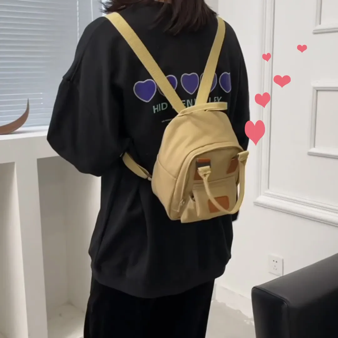 Mini Mochila pequeña coreana para mujer, bolso de lona para chica adolescente, bolso de hombro para teléfono, monedero femenino, nueva tendencia de moda