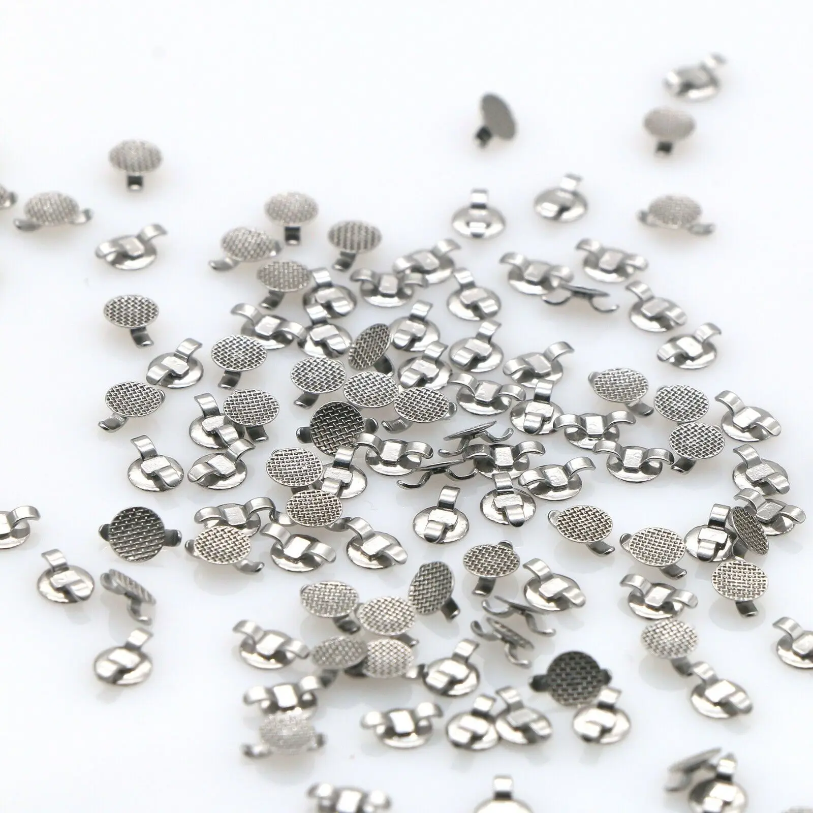 100 Pcs Dental Orthodontic Bondable Lingual Cleat Buttons Double Wing Round Mesh