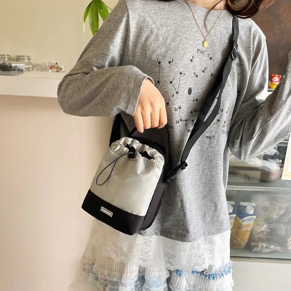 

Nylon Drawstring Shoulder Bag Adjustable Strap Korean Style Phone Bag Large Capacity Lightweight Water Bottle Bag Male