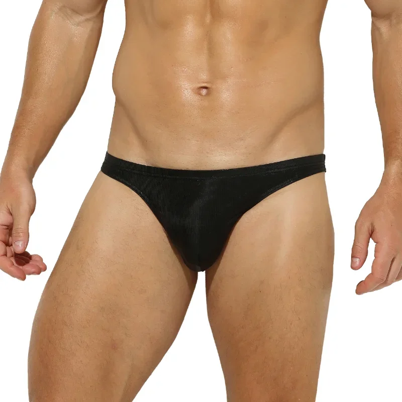 

Men Low Waist Bikini Briefs Metallic Shiny Faux Leather Underwear Sexy Bright Underpants Gay Male Bulge Pouch Breathable Panties