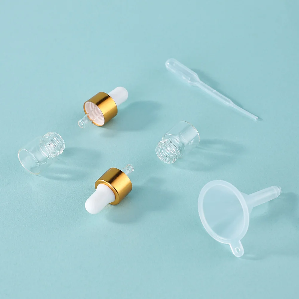 100 peças 1ml tampa dourada frascos conta-gotas vazios de vidro conjunto com 24 pipetas 24 funis-garrafas recarregáveis à prova de vazamento para cosméticos de essência